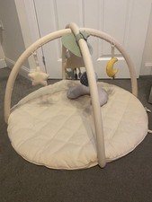 Baby Activity Gym Playmat with hanging toys.