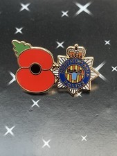 Northumbria police poppyy pin Badge