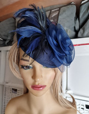 women's hair ornament made of natural feathers and mesh