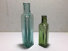 2 Nice DIFFERENT COLOURED Old Triangle Shaped Ink/Gum Bottles AMBER SWRLS