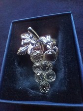 Boxed Swarovsk Bunch of Grapes with silver colour leaves Pin Brooch. Unworn.