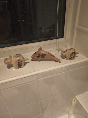 Hippos and dolphin - and,