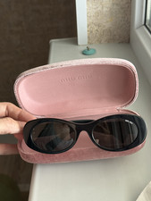 Miu Miu Black Oval Sunglasses