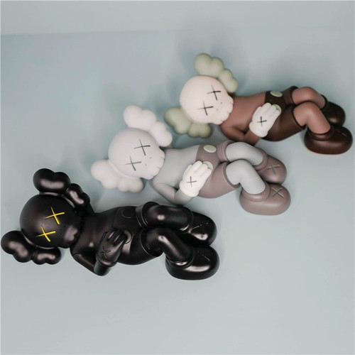 Kaws companion lying leisurely - lying,
