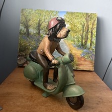 SCOOTER IN RESIN WITH DOG