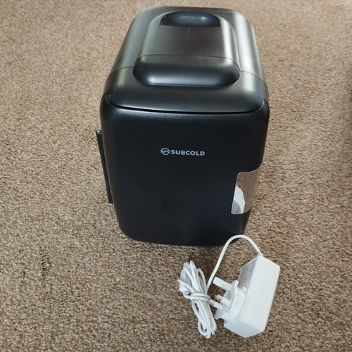 The black mini - -fridge, is