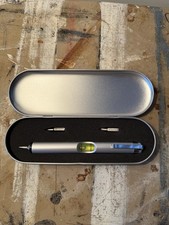 Pocket tool with - spirit, level