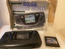 Sega Game Gear with 2 games and original box.