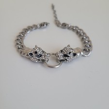 Stunning panther biting chain - biting,