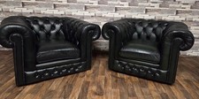 A pair of chesterfield Thomas Lloyd club chairs in Antique green leather 