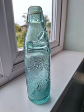 Vintage Old Antique Glass Cod bottle. "BASINGSTOKE " M B W CO.  Mineral water.