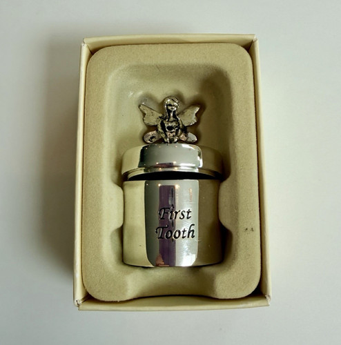 First tooth past times silver - tooth,