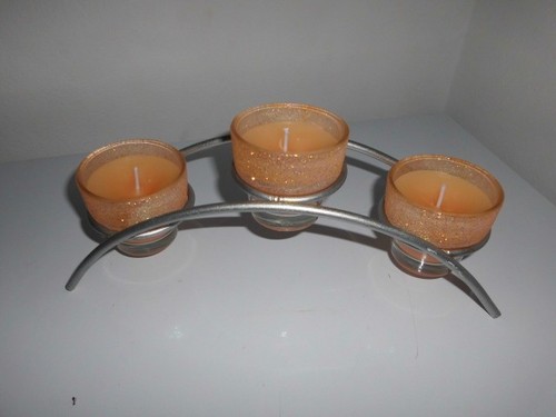 Three candles sparkling - three,