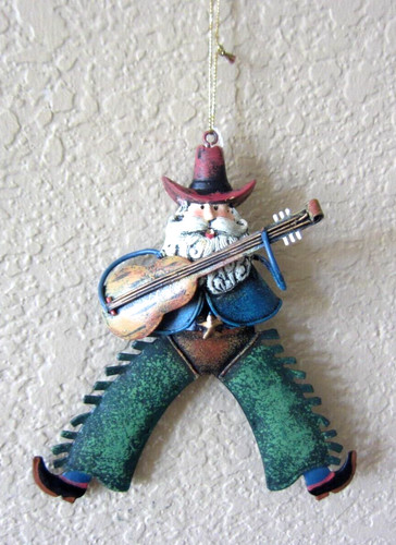 Western cowboy playing guitar - cowboy,