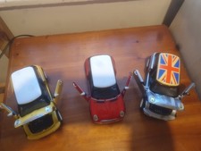 SS 6711. 2001 MINI COOPERS. 1/24 SCALE. DIE CAST MODEL CARS. PULL & GO, 3 MODELS