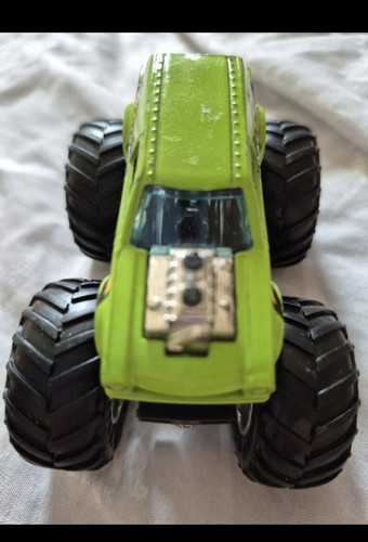 Green black diecast monster - &,
