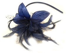 NAVY FLOWER FASCINATOR ON A