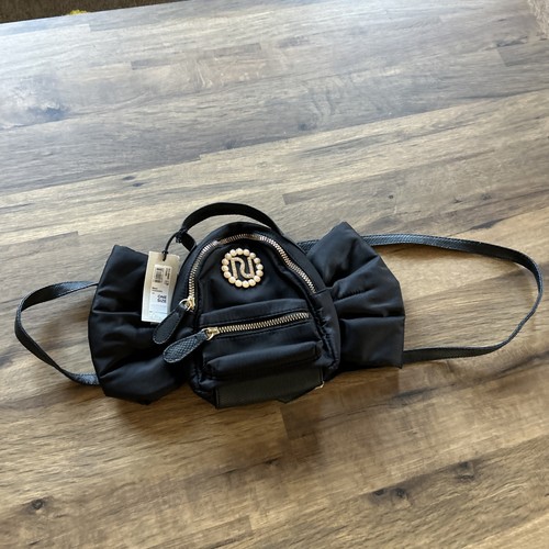 River island bow backpack - island,