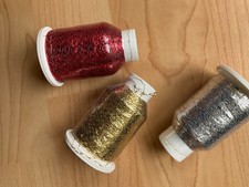 3 spools Drops Glitter thread to knit or crochet alongside yarn to give sparkle