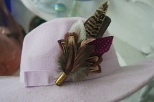 feather and bullet brooch, hat pin, lapel pin, wedding buttonhole