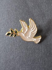 Dove of peace pin badge.