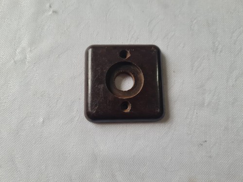 One single bakelite backplate - one,