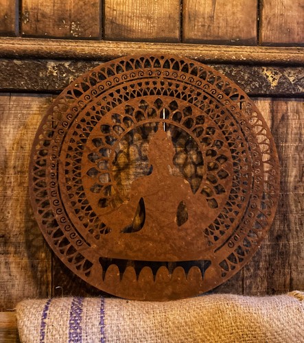 Rusty metal meditating buddha - rusty,