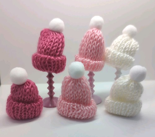 Bobble hats and hatstand - and,