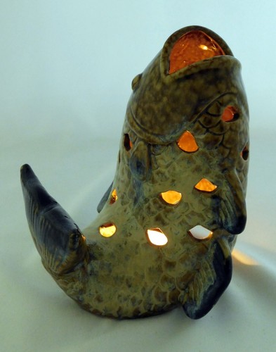 Leaping carp with perforations - carp,