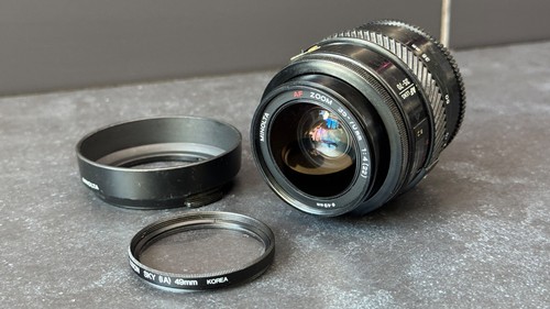 Minolta 70mm zoom lens - minolta,