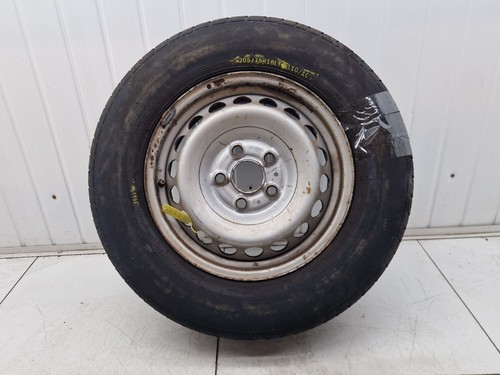 Man tge steel wheel with - steel, worn