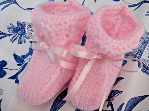 Lovely hand knitted baby - hand,
