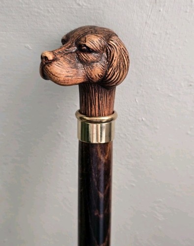 Dog head handle crafted from - dog,