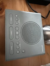 John Lewise  compact alarm