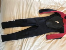 Full Body wetsuit, size small. Two Bare  Feet. Approx 10 years. Damaged