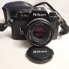 Nikon EM Camera With 50mm Lens