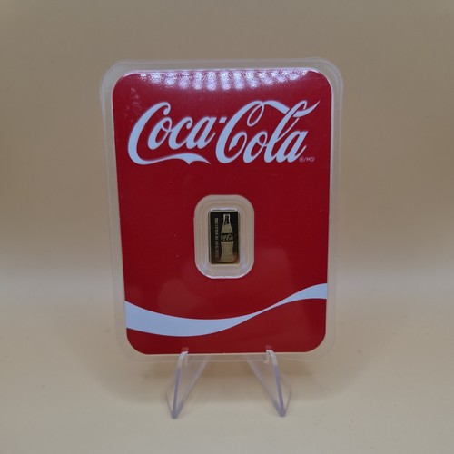 Coca cola gram - gram, gold