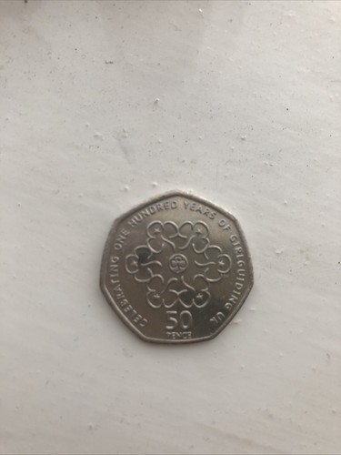 Coin celebrating one - 50, p