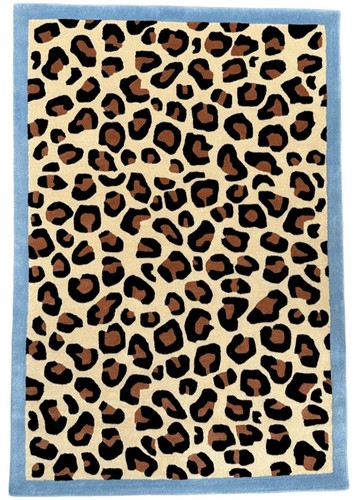 Hand tufted leopard print wool - hand,