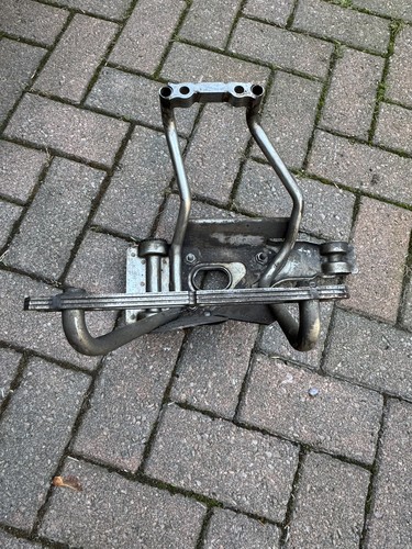 Bracket rear exhaust - rear, silencer