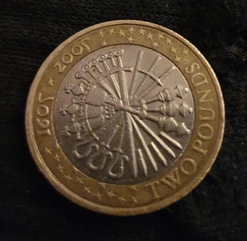 Pound coin with misprint - £2,