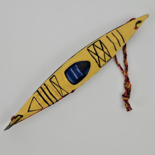 Touring yellow kayak outside - yellow,