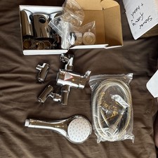 Bristan shower mixer tap and a shower head with hose