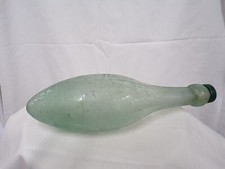 Antique Torpedo Shape Mineral Bottle