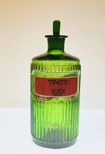 Antique green glass apothecary - green,