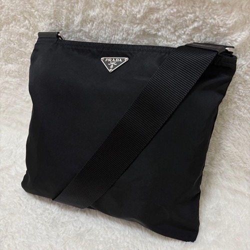 Prada triangle logo black - prada,