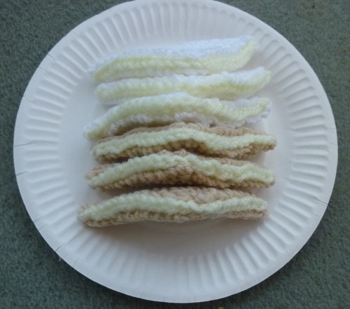 Hand knitted banana sandwiches - hand,