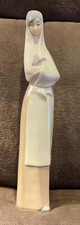 NAO by LLADRO Lady Holding
