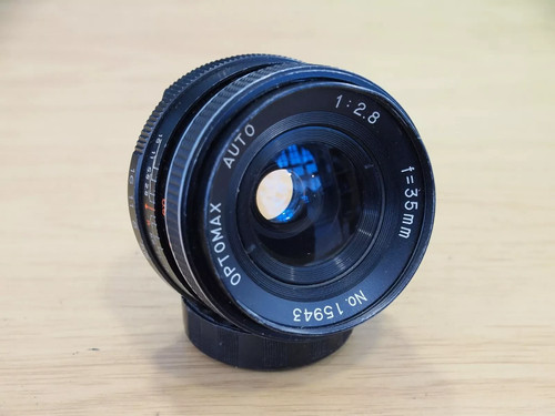 Optomax auto 35mm 8 - 35mm, f/2.8