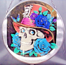 Etched and coloured image on